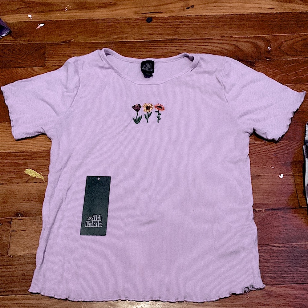 Purple short-sleeve top with flower print